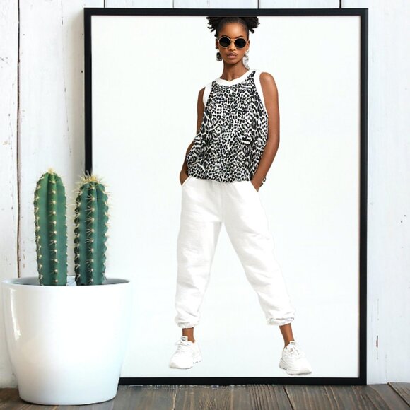 Elizabeth and James Cream Black Leopard Print Asymmetrical Top, Size XS - Picture 1 of 6